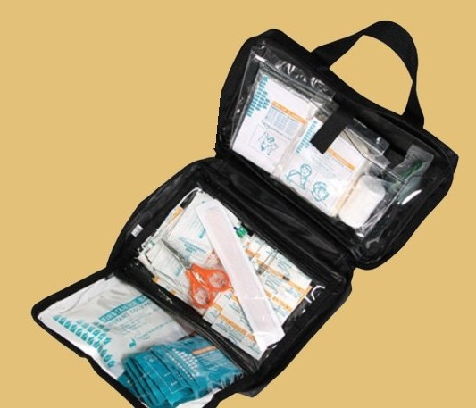 The Ready Reserve case unzipped, showing first aid supplies organized in clear pockets